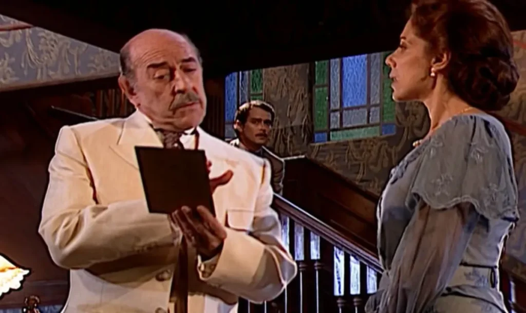 Janete acha foto comprometedora de Francesco com Paola em Terra Nostra e dispara: “Quem é a sirigaita?”